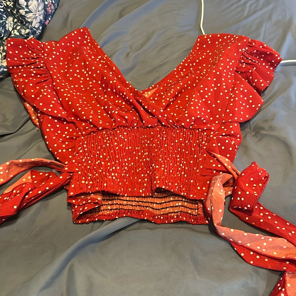 Red polka dot shirt